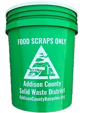 Green five-gallon bucket for food scraps